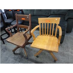 2 Vintage wood swivel office chairs on casters