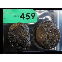 2 Carved stone pendants
