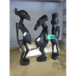 8 Carved wood statues