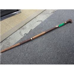 Folk art cane with a lion head