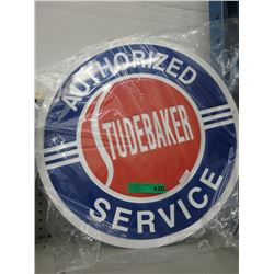 Round 23" dia metal "Studebaker Service" sign