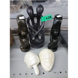 5 Carved stone statues