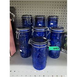 7 Blue glass canisters