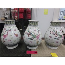 3 Oriental vases with dragon motif