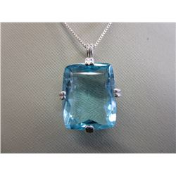 Swiss Blue 27.87 emerald cut Topaz pendant
