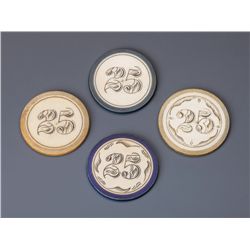 Lot of four "25" Poker Chips
