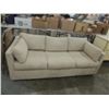 Image 1 : VINTAGE CREAM COLORED SOFA