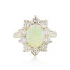 Image 1 : 14KT Yellow Gold 1.48ct Opal and Diamond Ring