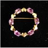 Image 1 : 14kt Gold Pin with Six Amethyst Stones