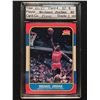 Image 1 : 1986-87 FLEER #57 MICHAEL JORDAN ROOKIE CARD. SET IN HARD CASE, GRADED 8 NM BY ASA INC.