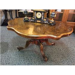 ANTIQUE BURR WALNUT TABLE WITH FIGURED, QUARTER MATCHED VENEER TOP, SUPPORTED BY CASTERS 51" X 41" X