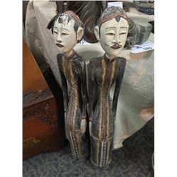 PAIR OF HAND PAINTED DECORATIVE WOODEN FIGURINES