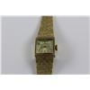 Image 1 : ONE 14KT. YELLOW GOLD W.H. GRASSIE LADIES DRESS STYLE WRIST WATCH. HAS A TEXTURED BEZEL AND