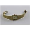 Image 2 : ONE 14KT. YELLOW GOLD W.H. GRASSIE LADIES DRESS STYLE WRIST WATCH. HAS A TEXTURED BEZEL AND
