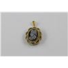 Image 1 : ONE ANTIQUE 14KT YELLOW GOLD NATURAL WHITE SEED PEARL AND NATURAL LAYERED SARDONYX CAMEO PENDANT.