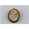Image 1 : ONE YELLOW GOLD PLATED OVAL SHAPED NATURAL SHELL CAMEO BROOCH-PENDANT,  IS BEZEL SET WITH 1 OVAL