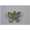Image 1 : ONE 14KT YELLOW GOLD & RHODIUM FINISH BUTTERFLY PENDANT.  REPLACEMENT VALUE$525.00