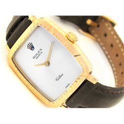 Lady Rolex 18K Yellow Gold Cellini Watch. Silver Dial. 18K Yellow Gold Bezel. Brown-Leather Strap. S