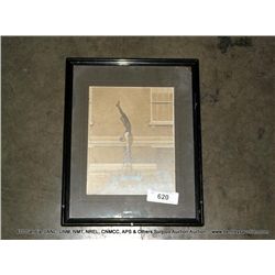 FRAMED PORTRAIT OF MAN SHOWING STRENGTH