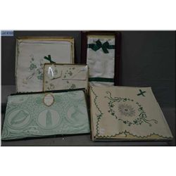 A selection of unused and boxed vintage Irish linens including tablecloths and napkins, boxed hanker