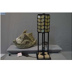 Two lamps including leaded glass table lamp with cast base and a fish motif table lamp