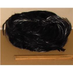 old hat with feathers; like nearly new