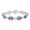 Image 1 : 14KT Two-Tone Gold 25.74ctw Tanzanite and Diamond Bracelet