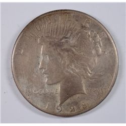 1928 PEACE SILVER DOLLAR, AU TONED, KEY