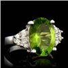 Image 1 : ONE OVAL CUT PERIDOT 5.29CTS, 2 ROUUND CUT DIAMONDS 0.22CTS