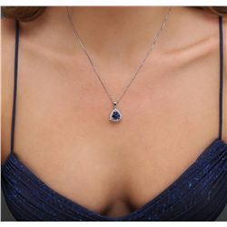 14KT White Gold 3.86ct Tanzanite and Diamond Pendant With Chain