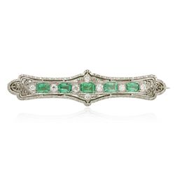 18KT White Gold 1.30ctw Emerald and Diamond Brooch