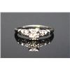 Image 1 : #46 18K GOLD DIAMOND 0.13CT RING