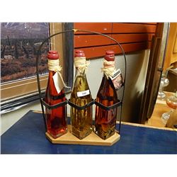 DESIGNOR BOTTLES WITH OILS AND HERBS - IN METAL BASKET