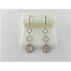 176-17541:14K white gold diamond earrings