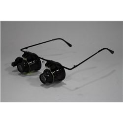 PAIR OF  MAGNIFYING LIGHTED GLASSES