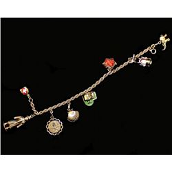 18K YELLOW GOLD CHARM BRACELET