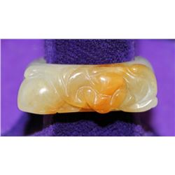 CHINESE WHITE JADE RING WITH ORANGE SKIN