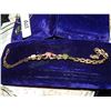 Image 1 : BRACLET - GOLD TONE - CLEAR RHINESTONES AND OTHER PRECIOUS STONES