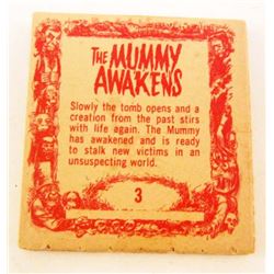 C. 1960S TOPPS "THE MUMMY AWAKENS" MOVIE FLIP BOOK