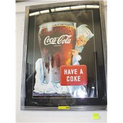 Framed Coca-Cola poster