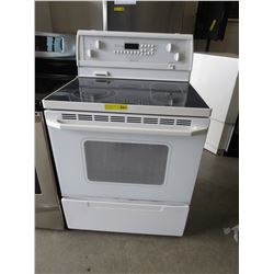 Used Whirlpool smooth top stove - white