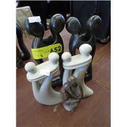 5 Carved stone statues