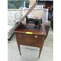 Vintage singer sewing machine in stand