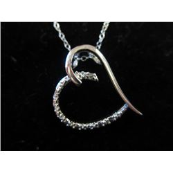 Diamond heart necklace set in sterling silver