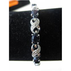 Blue Sapphire & Diamond infinity design bracelet