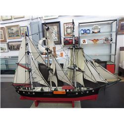 Wood ship model on stand