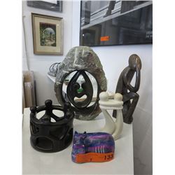 5 Carved soapstone statues