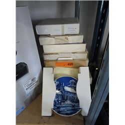 9 Collector plates in original boxes.