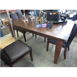 Wood dining table with built in leaf