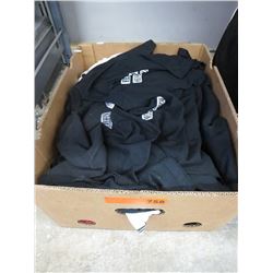 Box of new t-shirts with logos